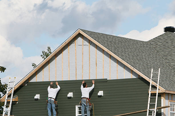 Professional Storm Damage Siding Repair technician working in Lorton, VA